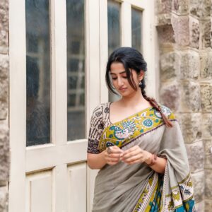 ash grey linen saree with kalamkari border