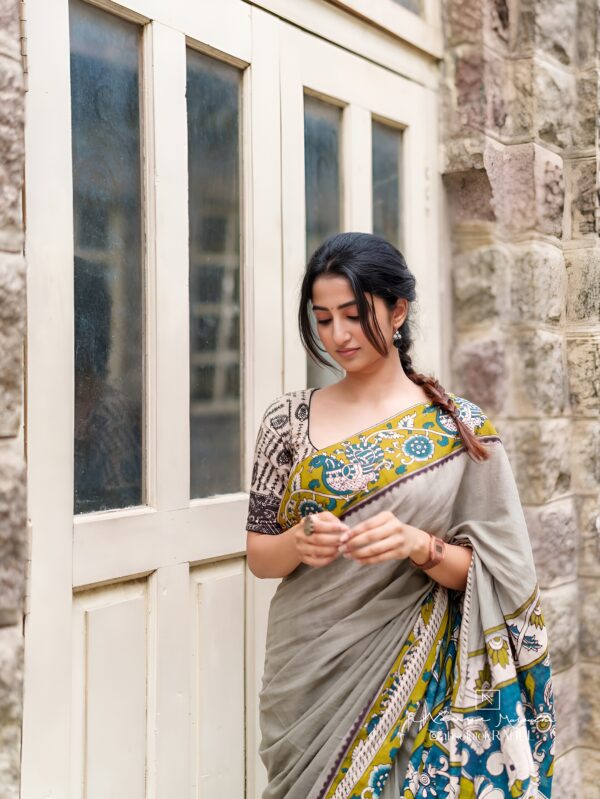 ash grey linen saree with kalamkari border