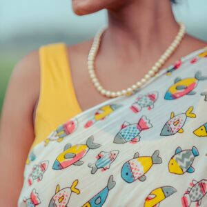 linen blend daily wear saree with yellow fish design