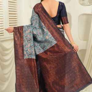 royal green jacquard saree with statement copper border